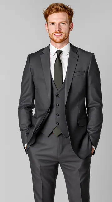 Photo of a red-haired man in a charcoal suit